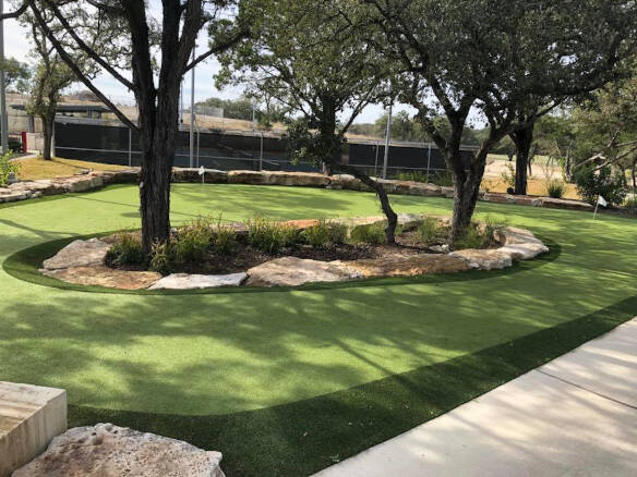 Residential backyard putting green grass